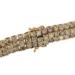 zoom dettaglio colori diamanti su bracciale multifilo tennis in oro rosa