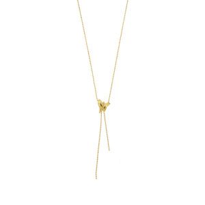 Collana in oro giallo 18 kt, maglia a pallini con ciondolo a forma di farfalla e due catenine a pallini pendenti.