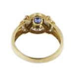 retro e interno di anello vintage a fiocco in oro giallo con diamanti e zaffiro