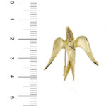 spilla a forma di rondine in oro giallo con diamanti foto paragone righello per misura gioiello lunghezza in cm