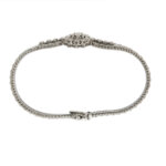 bracciale in oro bianco con fiore centrale con diamanti spessore