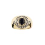 frontale di anello oro giallo con diamanti e zaffiro