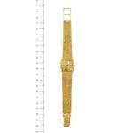 orologio Omega oro giallo foto paragone righello per misura gioiello mano lunghezza