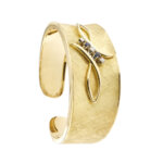 bracciale bangle in oro giallo con diamanti e zaffiri