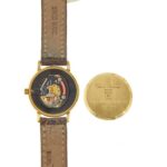 meccanismo interno orologio baume e mercier oro