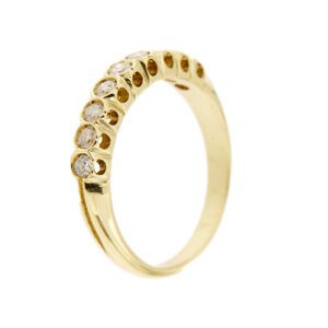 lato di anello riviere oro giallo con diamanti