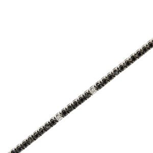 dettaglio tennis oro con diamanti neri e diamanti trasparenti